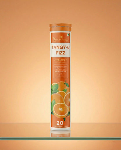 Tangy-C Fizz vitamin C supplement tube on a peach background